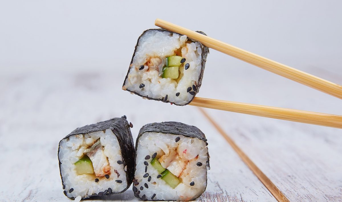 sushi rolls and chopsticks